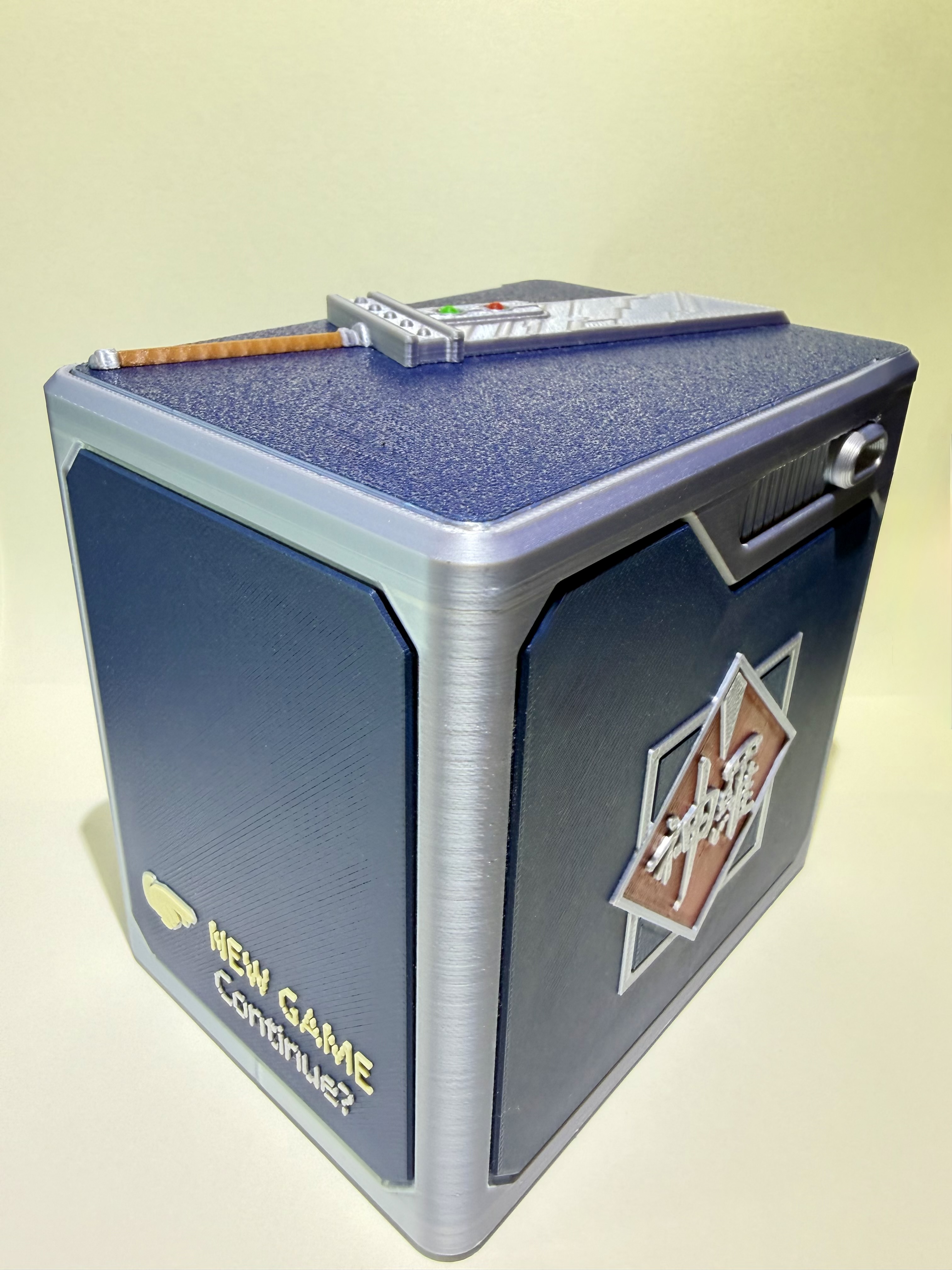 Rear panel of 3D printed FF7 MTG deck box featuring kanji detail and New Game Continue prompt
