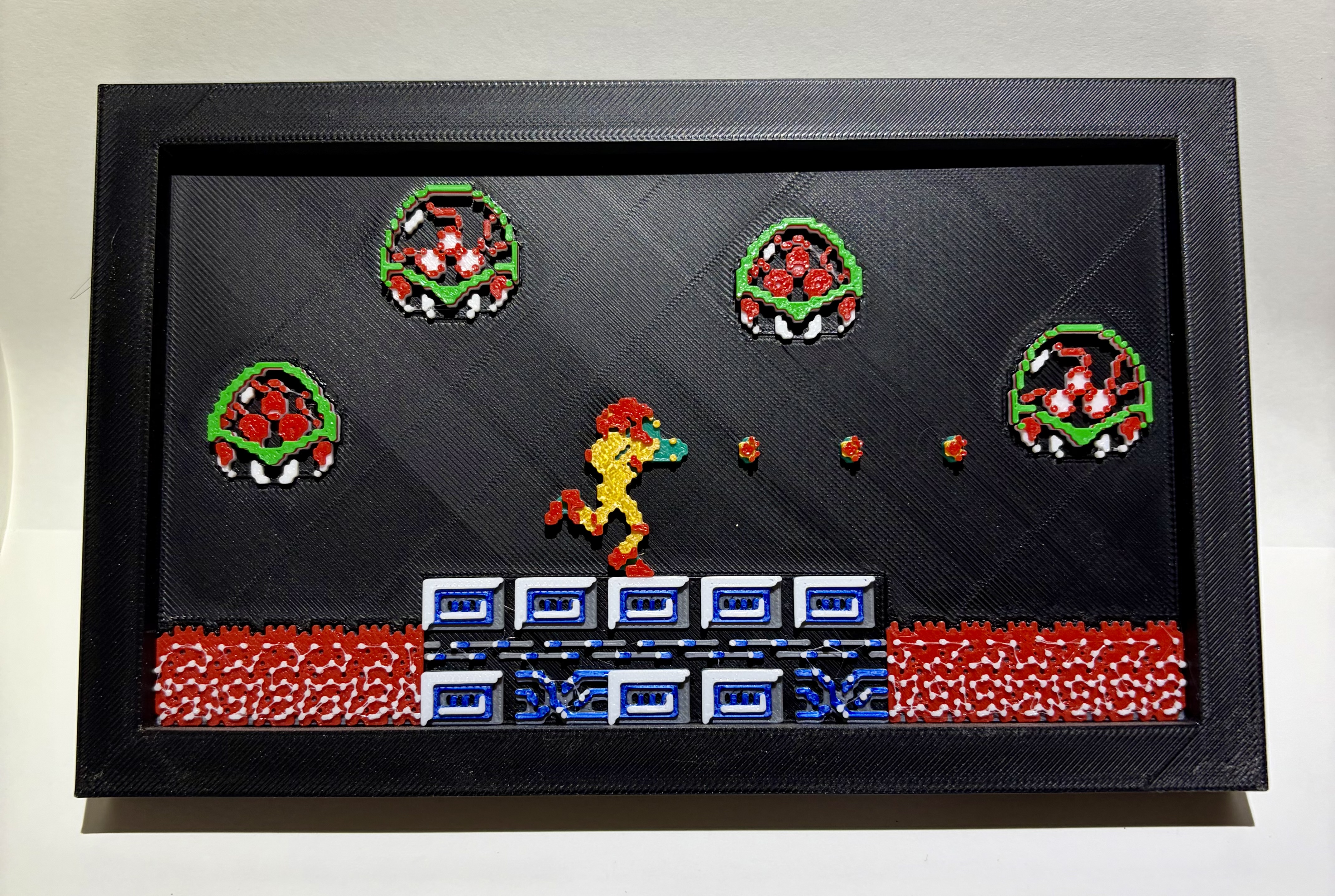 3D printed Metroid pixel art wall piece multi-color layered framed gaming room decor