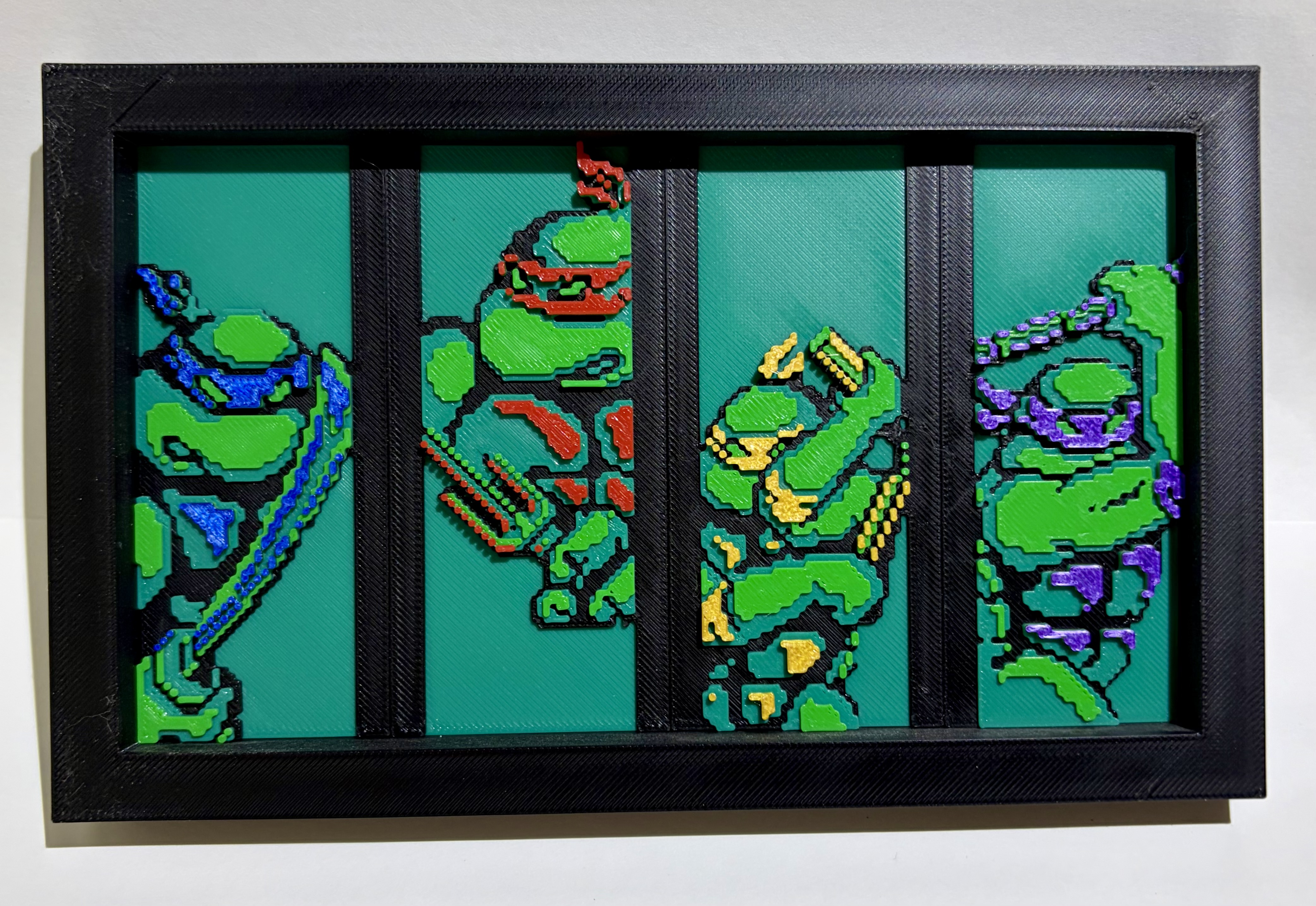3D printed TMNT Teenage Mutant Ninja Turtles pixel art wall piece all four turtles layered multi-color